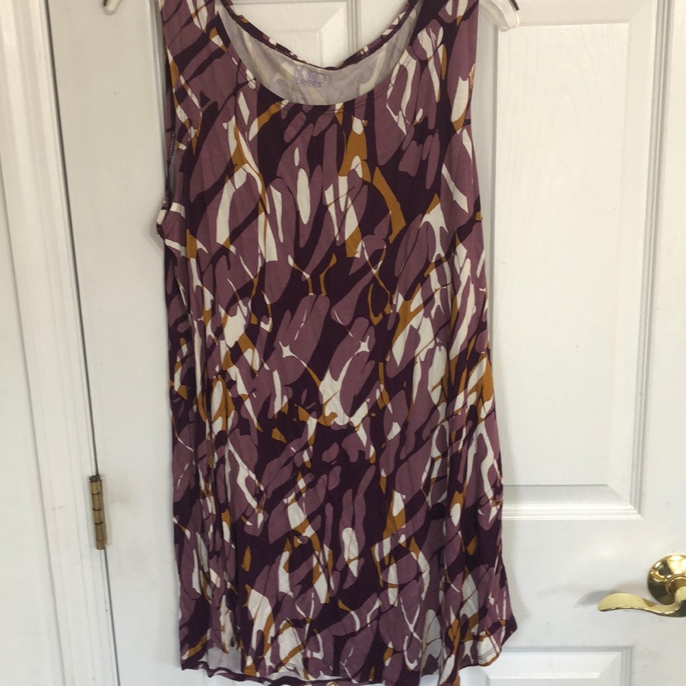 Long cami. Never worn. Wear under tunics.